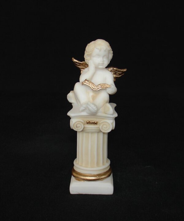 A statue of an Angel sitting on a column in Patina color