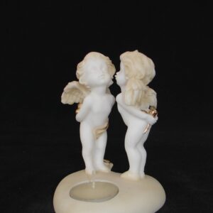 A statue of two Angels standing on a heart shape candle type 3 in Patina color