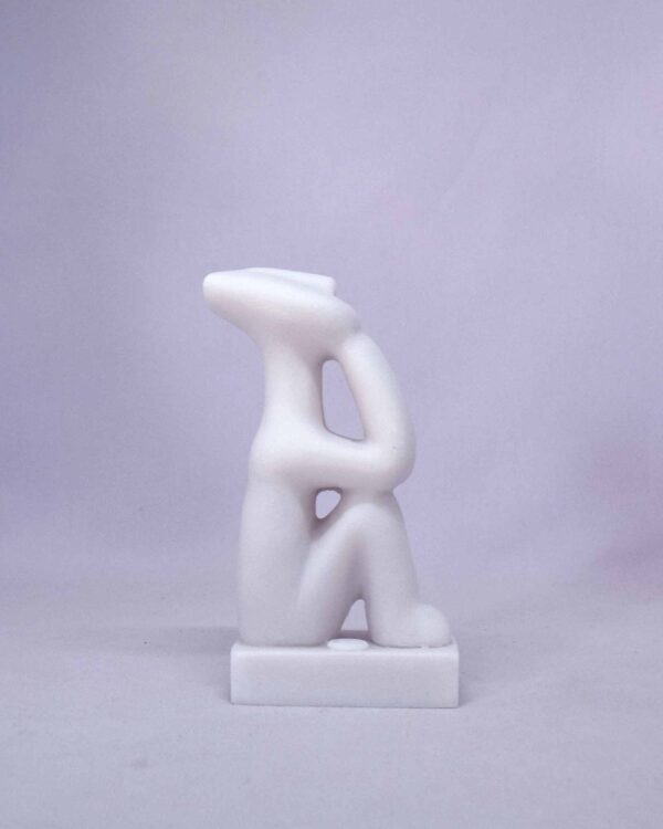The statue of a man who thinks in Cycladic art in White color