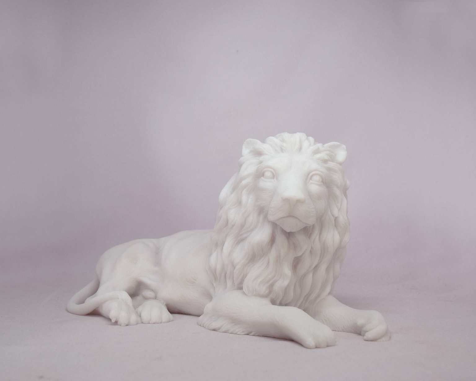 Lion lying down statue made of Alabaster