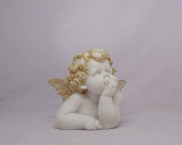The statue of a little Angel thinking in Patina color