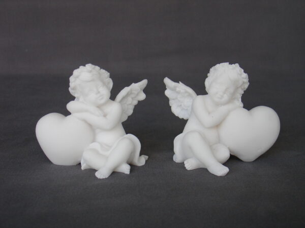 Statues of Angels hugs a heart