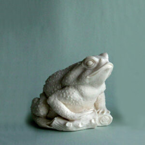 The statue of a frog in White color