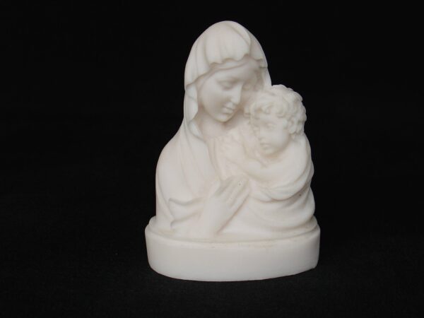 The bust statue of Mary and baby Jesus in White color