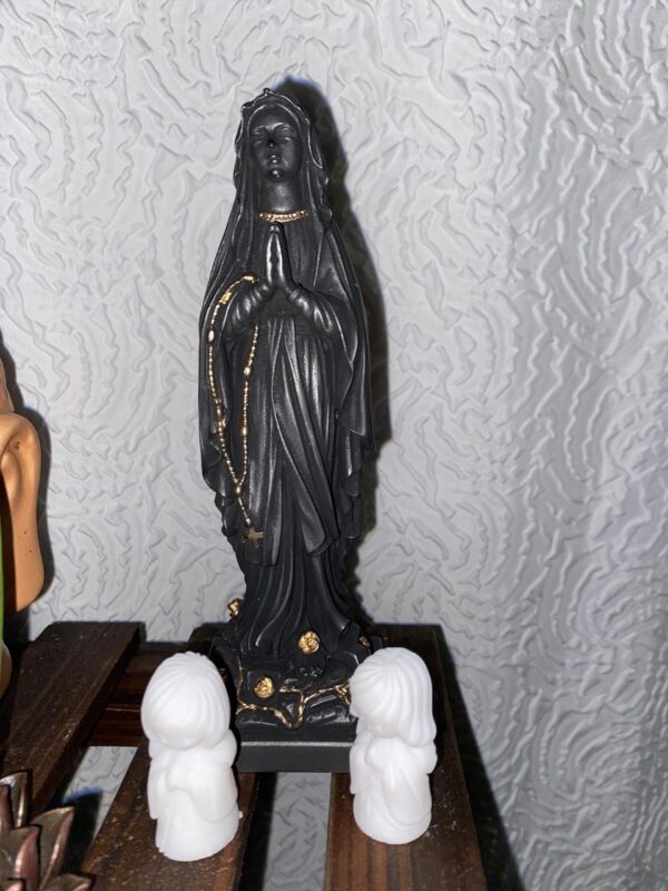 Statue of Virgin Mary praying in Black and Gold color